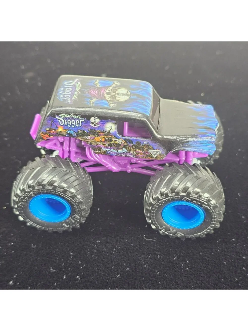 Grave Digger Monster Truck Toy Purple & Black 2024 Copyright Skeleton Design 4-W